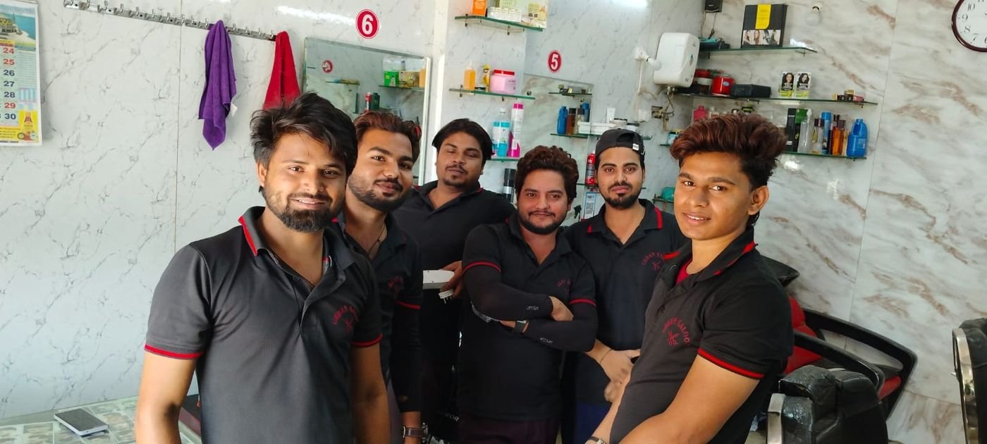 Urban Saloon barbers in uniform inside the salon in Hinjawadi